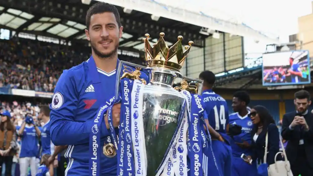 Eden Hazard of Chelsea poses with the Premier League trophy in 2017