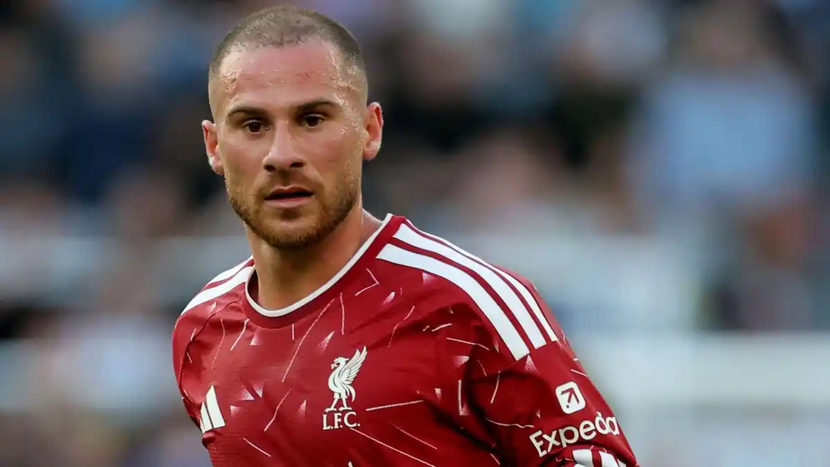 Liverpool midfielder Alexis Mac Allister, wearing the club's red home kit, looks on during a Premier League game