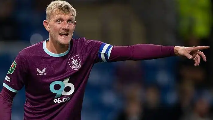 Joe Worrall points while playing for Burnley