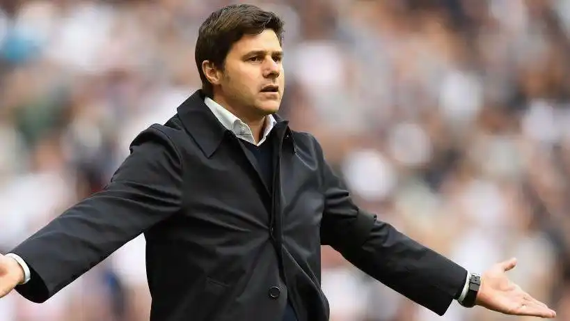 Tottenham manager Mauricio Pochettino stood with his arms outstretched during the FA Cup semi-final against Chelsea in 2017