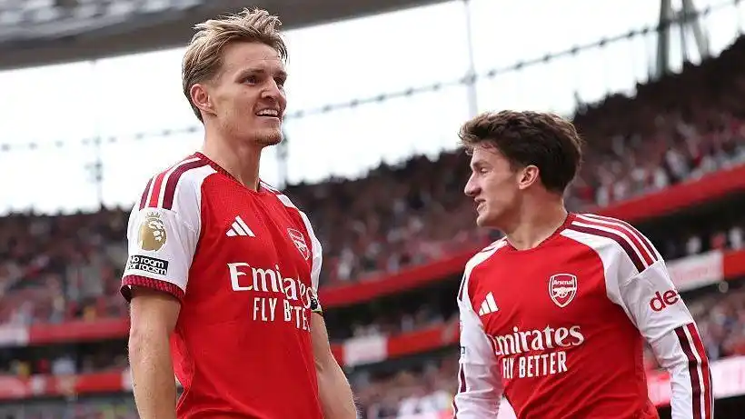 Martin Odegaard celebrates his goal with Arsenal's fans