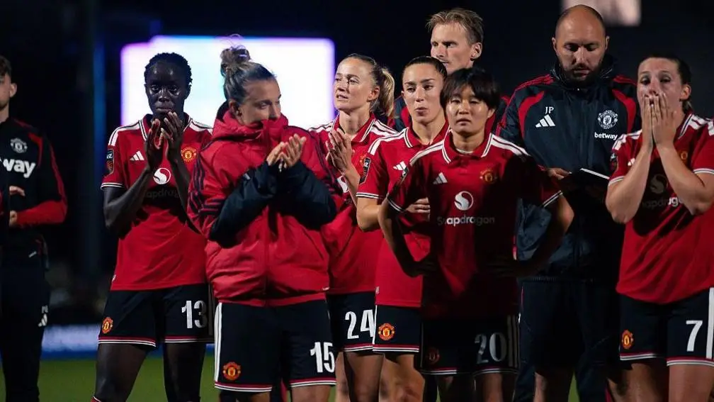 Manchester United players react at full-time