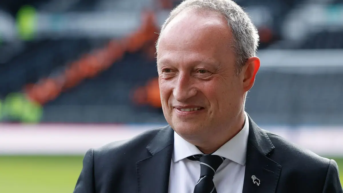 Derby County owner David Clowes on the pitch at Pride Park