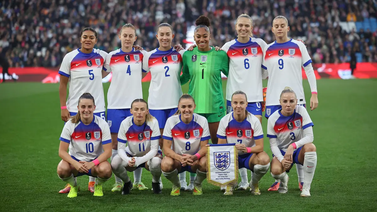 England line up before the friendly with China