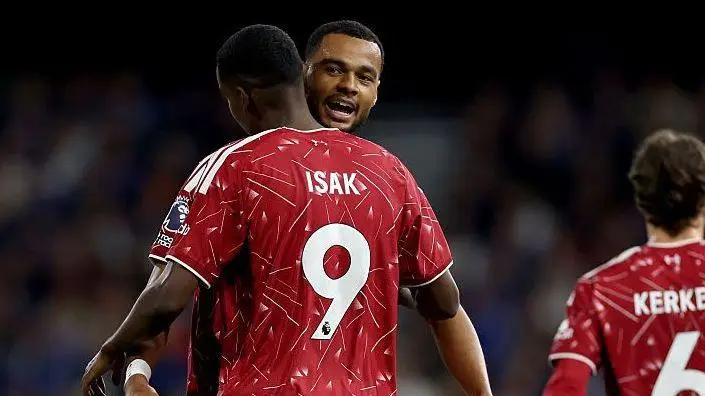 Cody Gakpo and Alexander Isak celebrate after the combined for the Swede to score Liverpool's second goal in their 2-0 win at Ipswich Town.