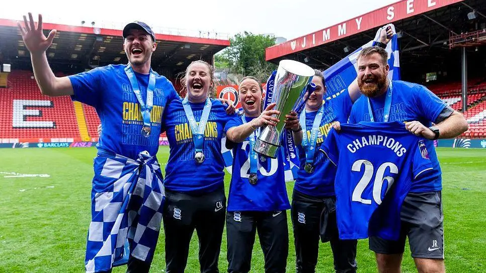 Birmingham players and staff celebrate winning WSL 2